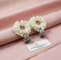 Surogya Handcrafted Floral Wreath Jhumka Earrings – White Bloom Edition