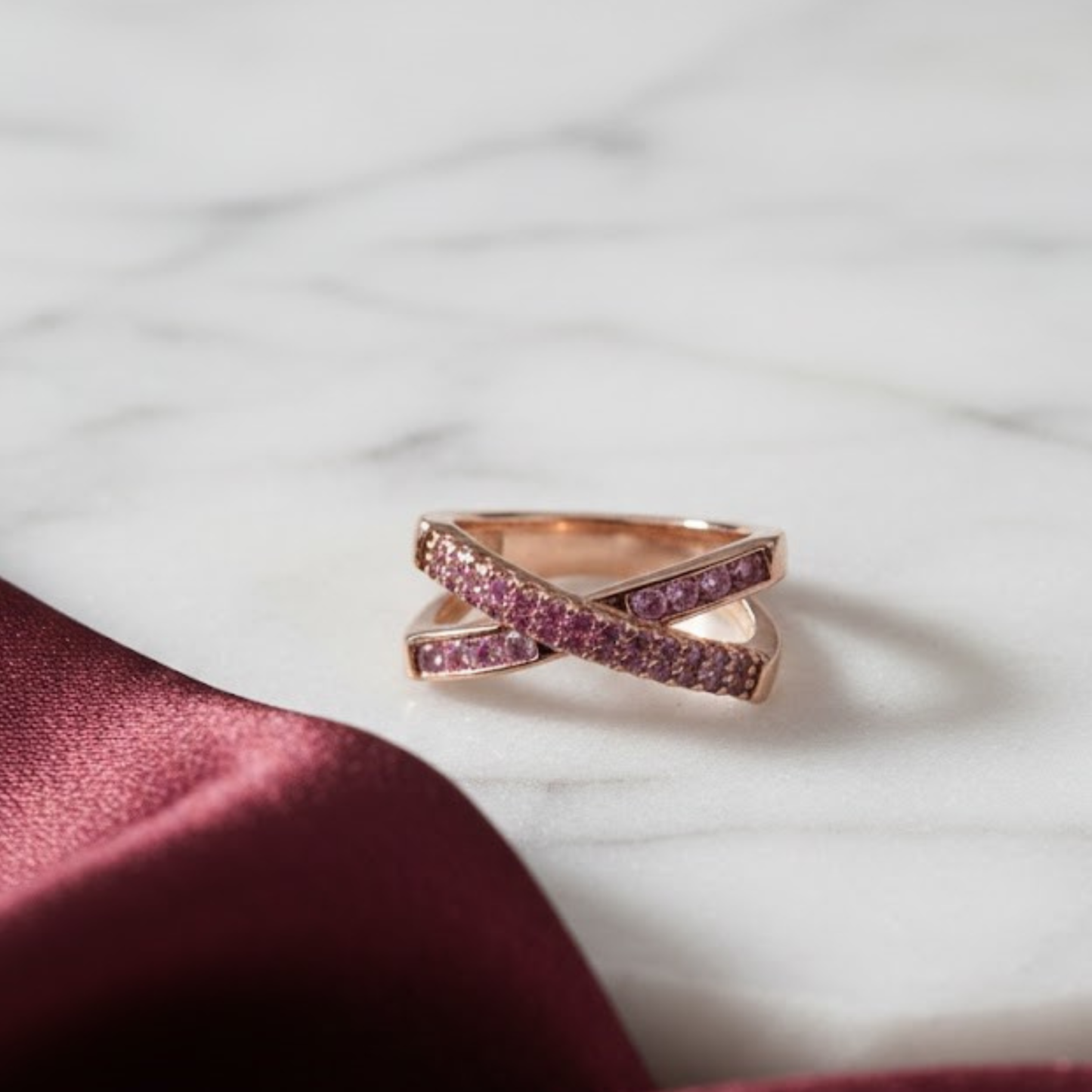 Luxury Rose Gold Intertwined ‘X’ Fine Jewelry Ring with Pink Stones