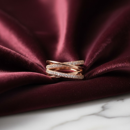 Elegant Rose Gold Intertwined Criss-Cross Fine Jewelry Ring with Sparkling Zirconia